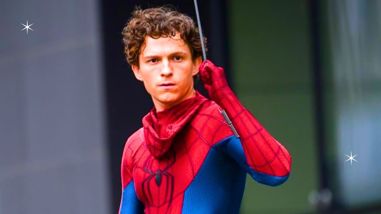 Spider-Man standing alone on a city rooftop at night wearing a simple red and blue homemade suit in Spider-Man Brand New Day